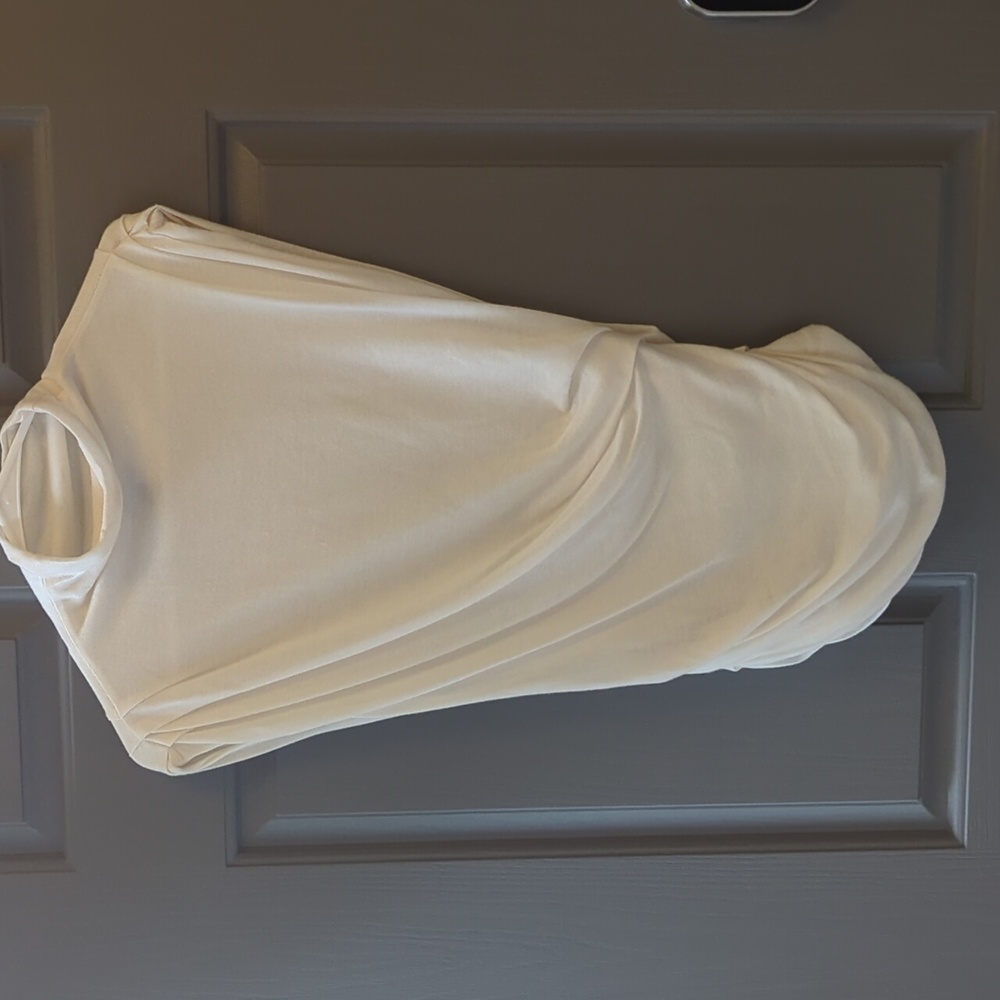 White sleeveless work top